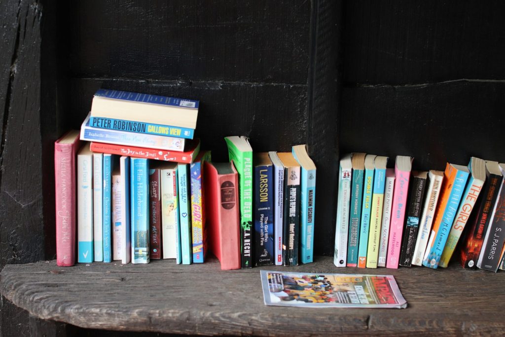 A collection of books on a shelf